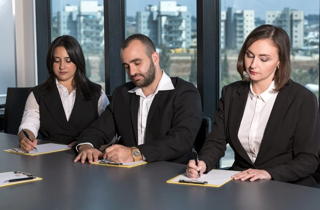 Documentation and legal compliance services with property lawyers reviewing contracts and agreements