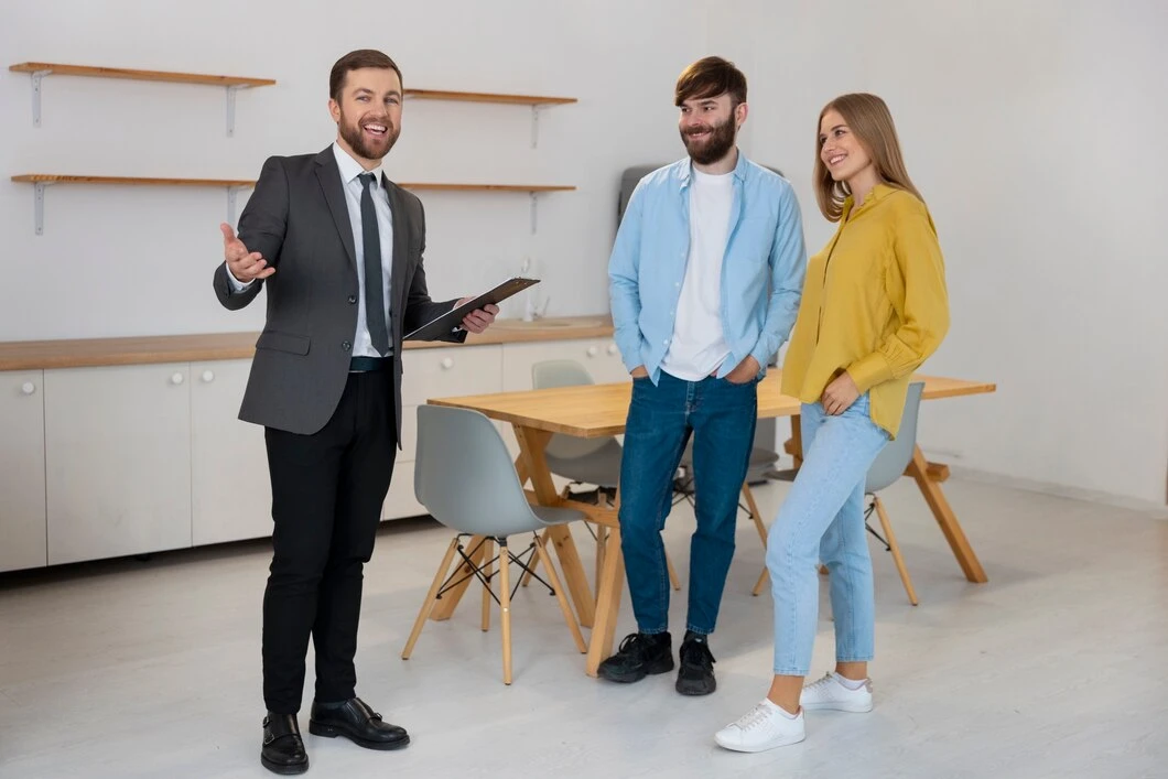 Elite tenant supervision services with property manager consulting prospective tenants in modern apartment