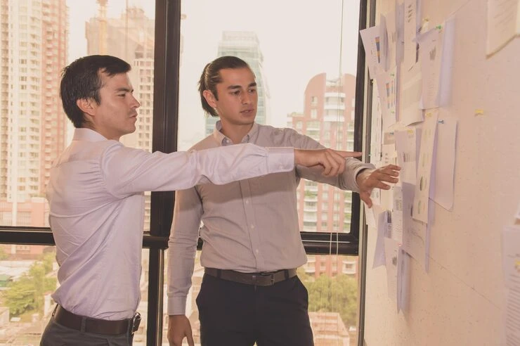 Real estate advisor reviewing exit strategy options for fixer upper property investment plan