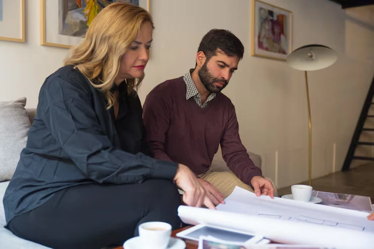 Real estate advisor reviewing rental yield data for fixer upper property investment analysis report