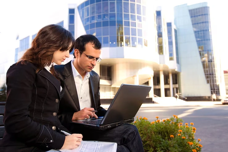 Expert real estate advisor reviewing Dubai property sourcing agency services for international buyers file