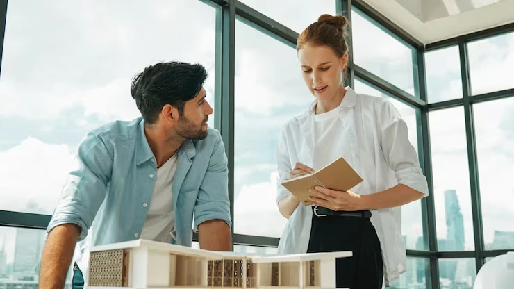 Expert real estate analyst reviewing market analysis charts and investment research data report file