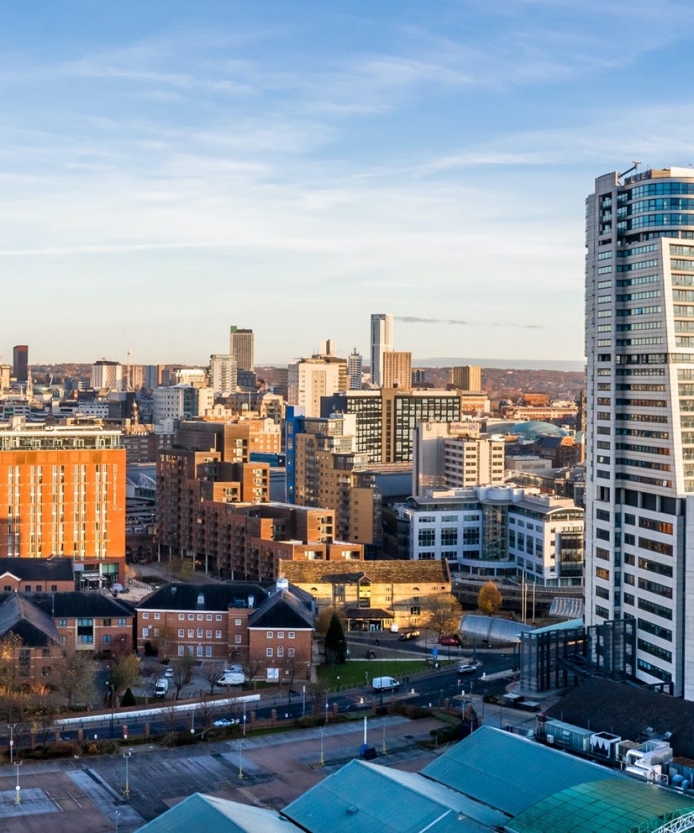 Aerial panorama of Leeds cityscape skyline with modern and old architecture buildings